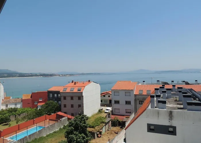 Apartamento con vistas al mar y playa enfrente